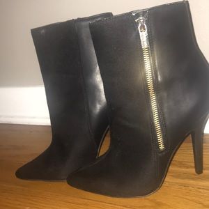 Jennifer Lopez black booties